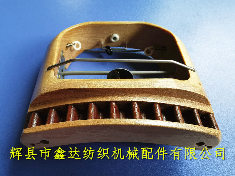 弧形織帶機梭子圖片